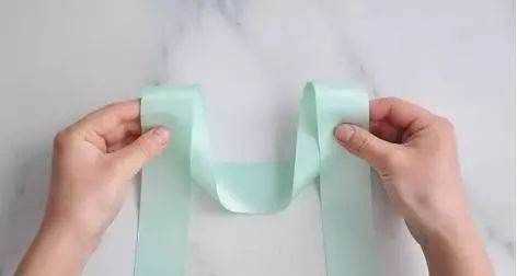 如何系蝴蝶結(jié),蝴蝶結(jié)怎么系視頻慢動作圖8