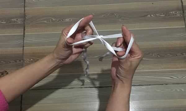 如何系蝴蝶結(jié),蝴蝶結(jié)怎么系視頻慢動作圖24